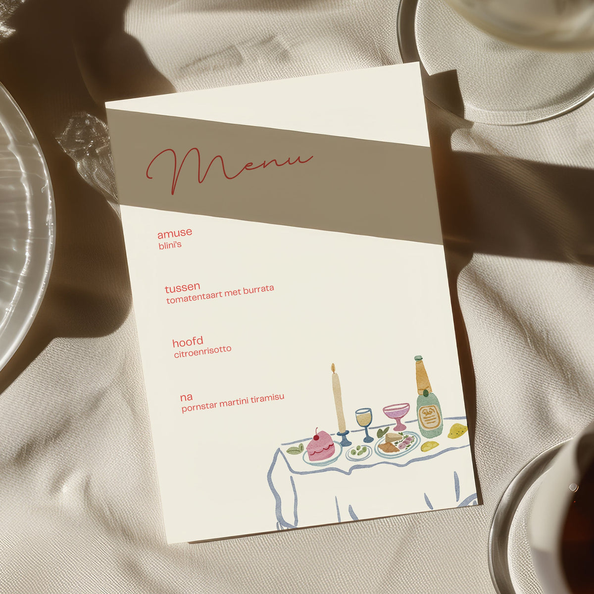 Dinner party menu card on a white tablecloth in the sun